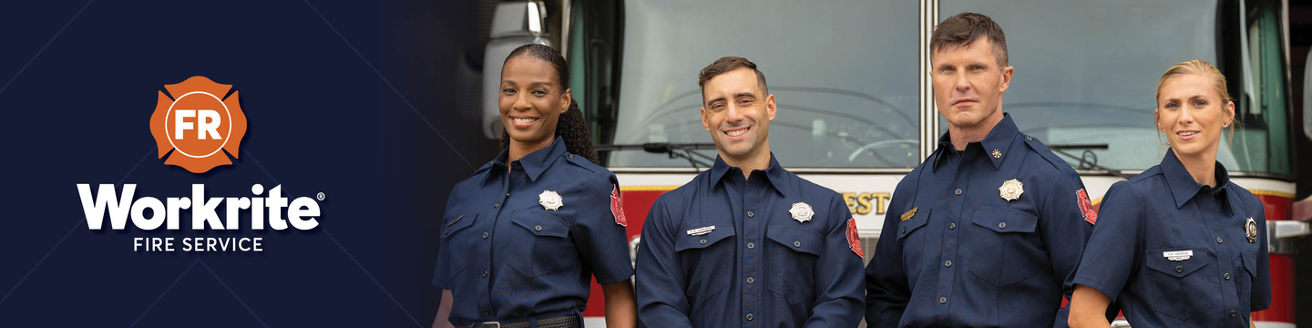 Four Fire Fighters In Front Of A Fire Truck